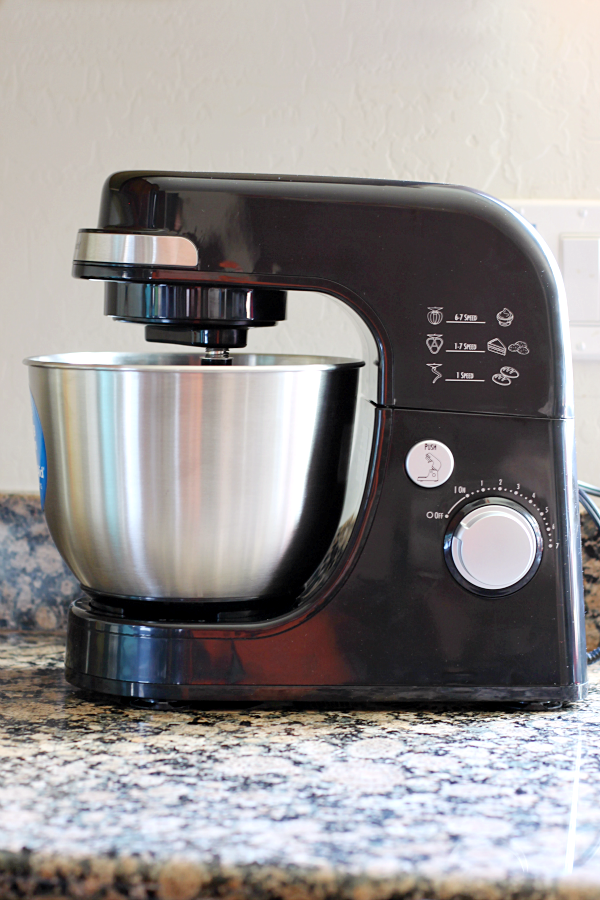 A black mixer on the counter top.