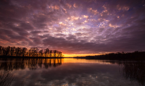 sunset sun reflection water clouds evening march pond michigan ottawa 2016 westmichigan ottawacounty thebendarea canon7dmarkii kevinpovenz ottawacountyparks