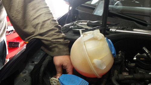 Coolant Tank pulled out of the way vw jetta motor mount replacement