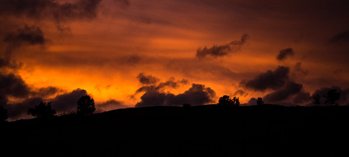 sunset red sky silhouette clouds tasmania