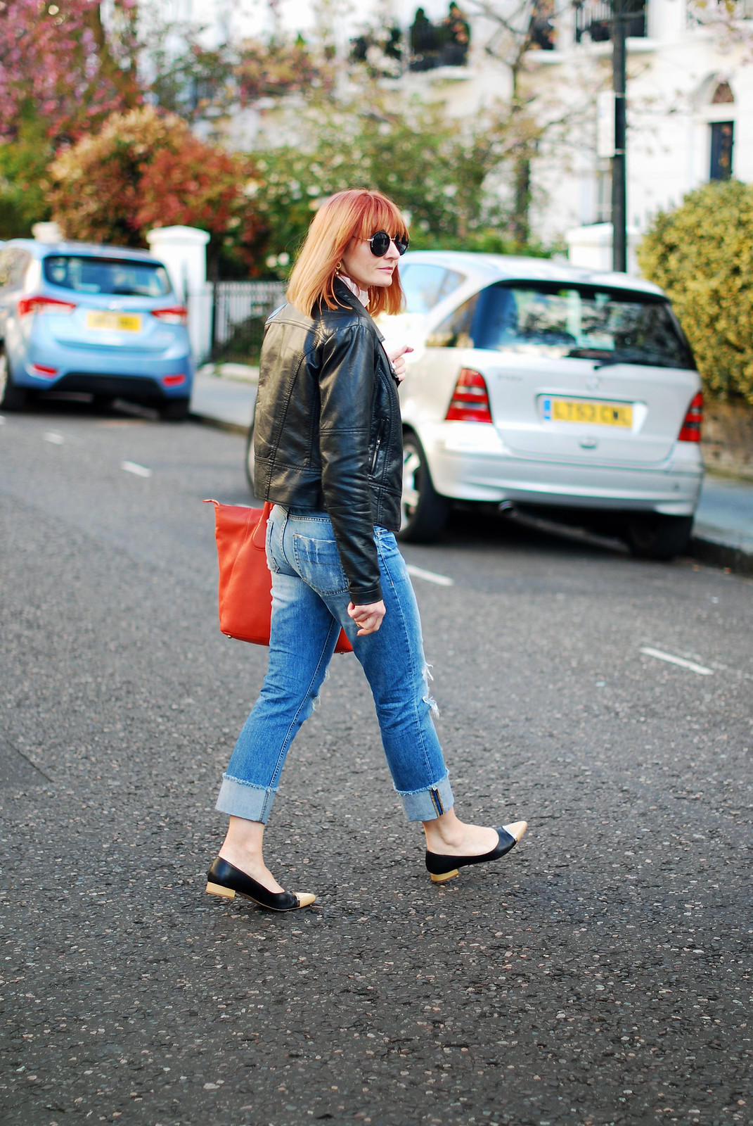SS16 Style: M&S Archive by Alexa ruffled Harry blouse, distressed boyfriend jeans, black biker jacket, orange tote, pointed two-tone flats | Not Dressed As Lamb