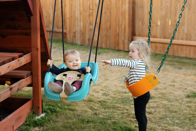 Swinging with sister