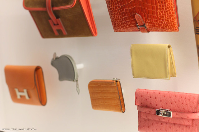 Hermes Leather Forever mouse and pink Kelly wallet display by little luxury list