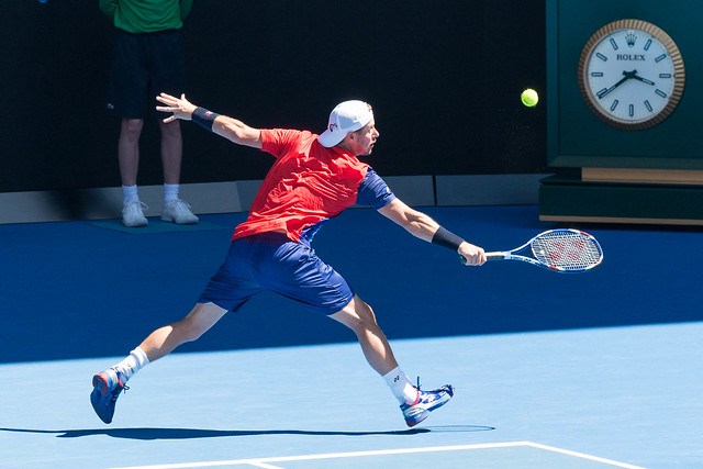 Lleyton Hewitt plays doubles with Sam Groth  at the Australian Open 2016