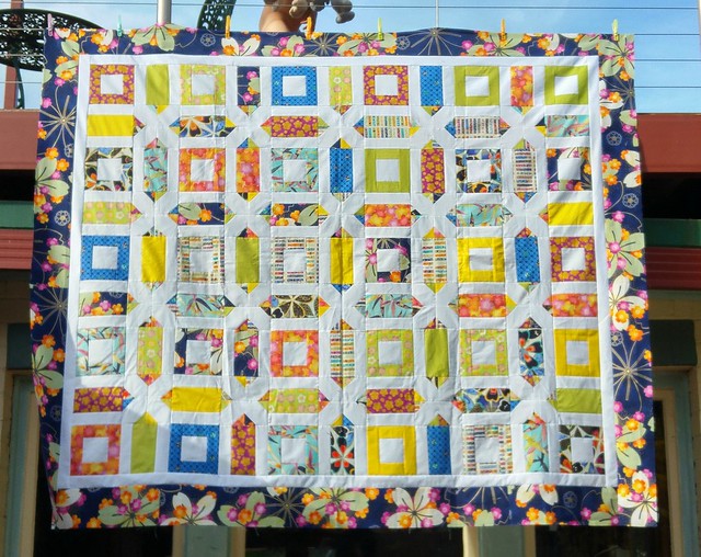 FINALLY! I had this all finished except the borders in September 2013. I wonder how many years until I quilt it.