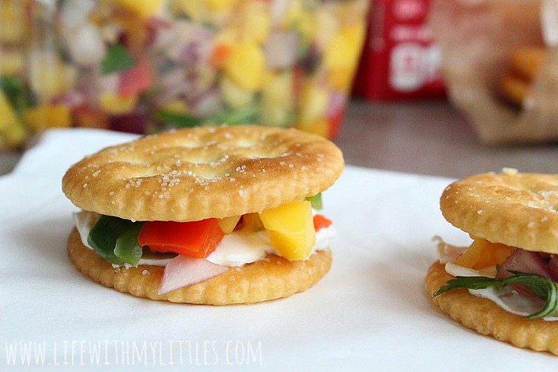 These easy and fast Cream Cheese and Mango Salsa RITZwiches are the perfect snacking solution for your next party! Get ready to be complimented!