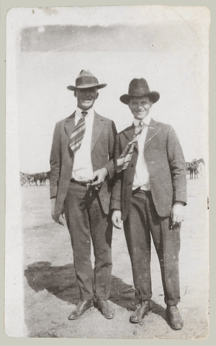 Two men with hats