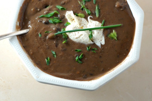 Black bean soup topped with creme fraiche and chives by Eve Fox, the Garden of Eating, copyright 2016