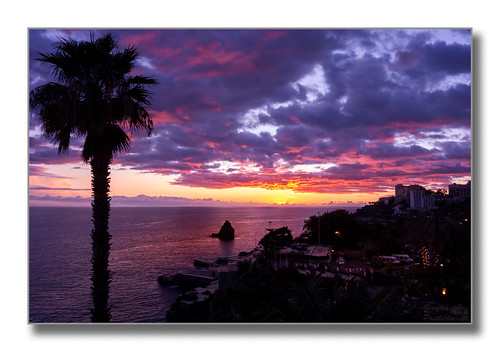 ocean sunset portugal water clouds buildings island lights rocks wideangle palmtrees madeira funchal lightroom sigma1020 photoborder canon40d
