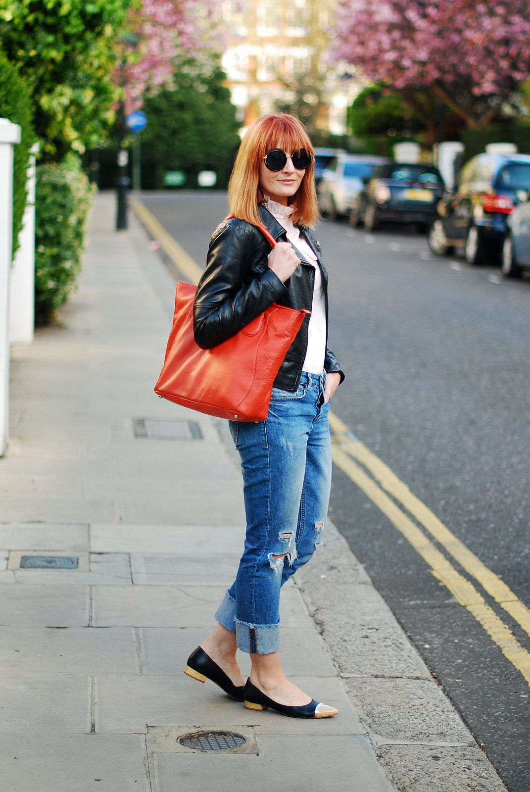 SS16 Style: M&S Archive by Alexa ruffled Harry blouse, distressed boyfriend jeans, black biker jacket, orange tote, pointed two-tone flats | Not Dressed As Lamb