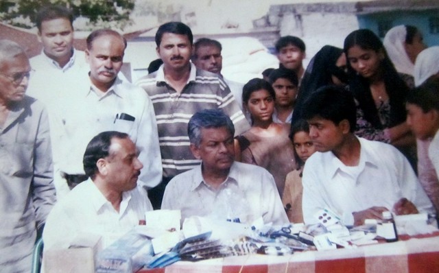 Dr Haneef  working in health camp during 2002 Gujarat riots