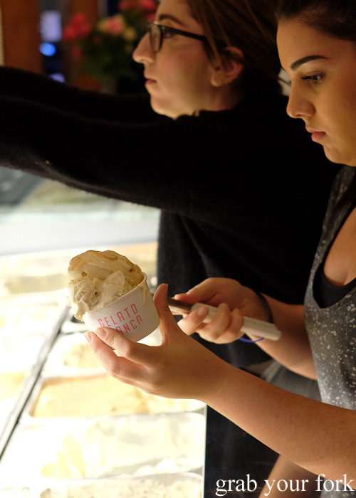 Scooping gelato from the cabinet at Gelato Franco, Marrickville
