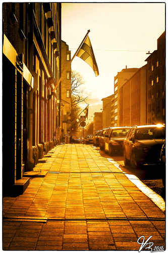street sunset cars finland golden evening spring turku flag olympus finnish m43 rauhankatu varsinaissuomi microfourthirds 45mm18 mzuiko epm1