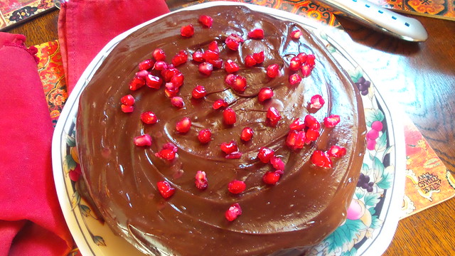 Chocolate cake with pomegranate seeds