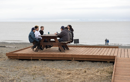 Young members of the tribe share a picnic table on the Cook Inlet beach during the Opening of the Net.
