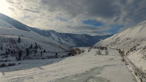 ranch winter usa cold art ice nature clouds forest river landscape unmodified flooding unitedstates artistic freezing bluesky hills idaho pasture valley vista northamerica rockymountains salmonriver hillside backroad baretrees pinetrees frozenover overflow unedited frozenriver wintry drone greyclouds nofilters ranchland noadjustments dji straightoffthecamera quadcopter shoupidaho northforkidaho phantom3professional