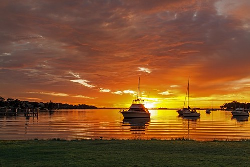 reflection water clouds sunrise pier stormy yachts lakemacquarie wangi