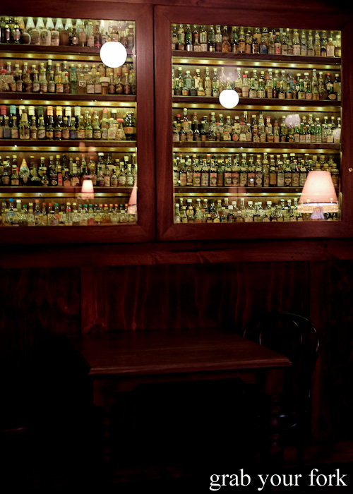 Mini spirit bottles at Restaurant Hubert Sydney