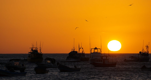 ocean sunset orange sun boats pacific harbour nicaragua sanjuandelsur
