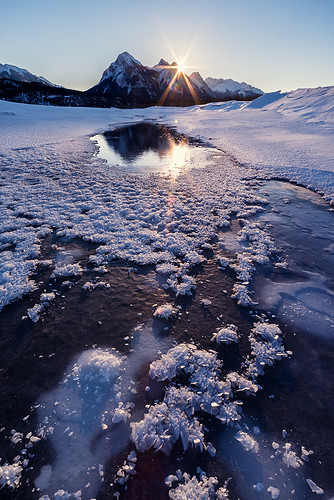 winter canada vertical sunrise frozen frost hoarfrost alberta frozenlake sunstar icefieldsparkway canadianrockies abrahamlake clineriver preacherspoint