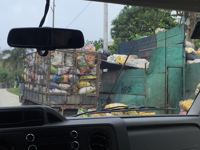 trucks selling recyclables to junk shops