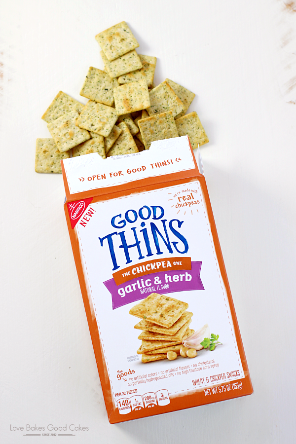 A box of nabisco good thins garlic and herb crackers.
