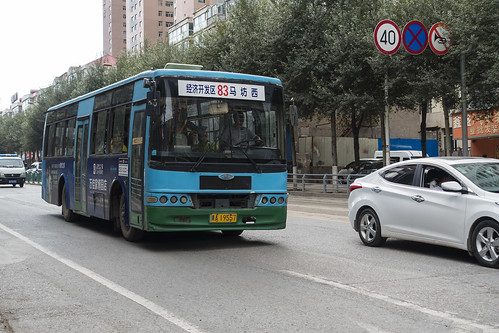 china road street people urban building bus cars sign asia qinghai xining chn sonyrx100iii