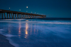 moon over pier