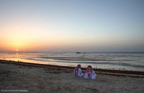 sunset sea people canon sand tide sigma qatar arabiangulf shamal 650d