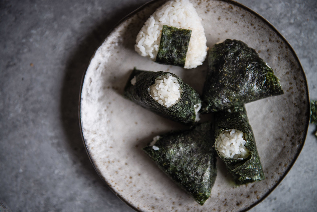 spicy salmon onigiri | two red bowls