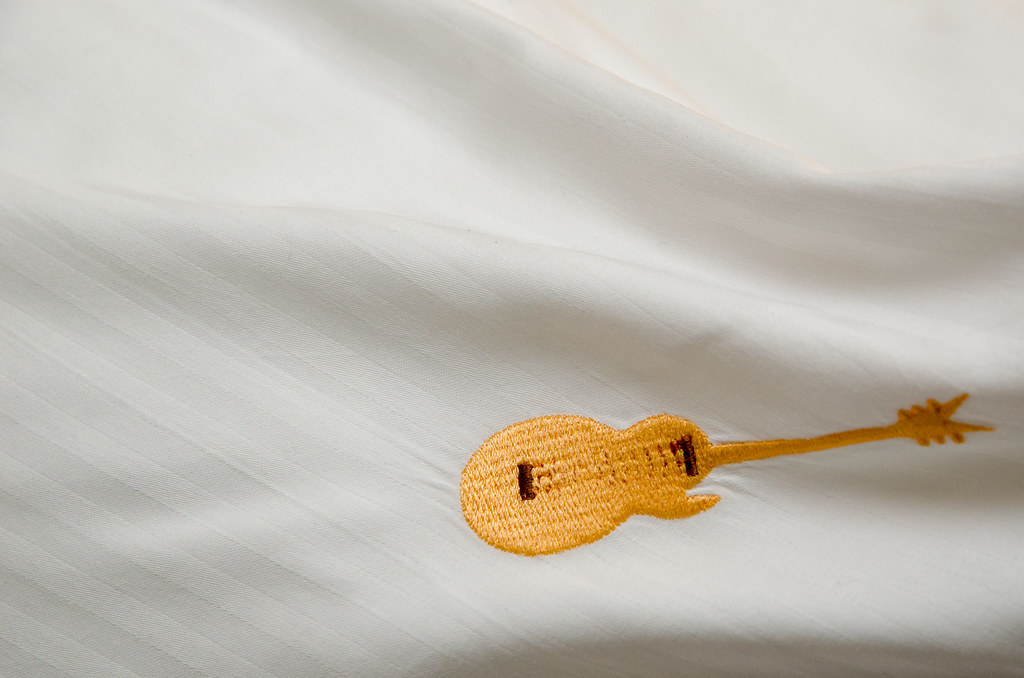 Tiny Guitar Embroidery on our pillow case
