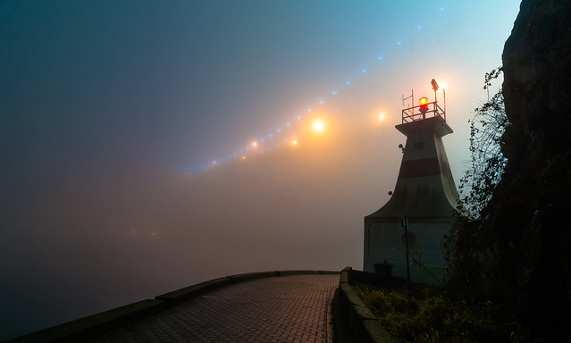 Prospect Point Lighthouse and Lion's Gate Bridge, foggy