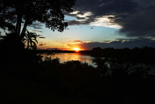 sunset lake reflection peru southamerica water river amazon rainforest shadows jungle