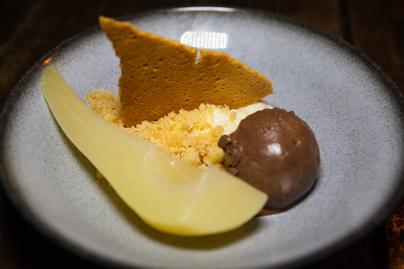 Dutch pearl barley pudding with nut crumble, chocolate sorbet, poached pear, ginger tuile