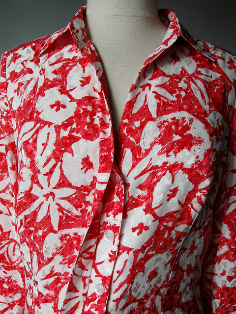 coral silk blouse with buttonholes