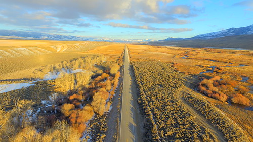 morning trees winter usa mountains art nature sunrise fence reflections river landscape vanishingpoint unmodified unitedstates artistic outdoor perspective bluewater meadow bluesky fromabove hills idaho snowcapped valley foreshortening vista northamerica pastures grasses rockymountains marsh hillside distance dirtroads bushes baretrees sagebrush wetland warmlight softlight unedited drone meandering highway28 nofilters straightroad noadjustments redwillows dji beaverheadmountains riverbends straightoffthecamera quadcopter lemhicounty lemhiriver leadoreidaho tendoyidaho elaboratefencing phantom3professional lemhirivervalley sacajaweascenicbyway