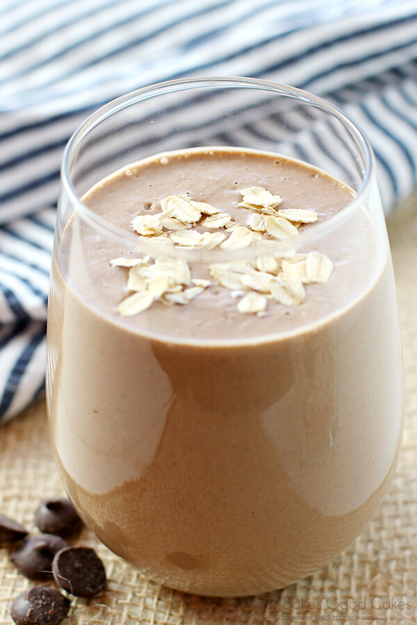 Chocolate Peanut Butter Oatmeal Smoothie in a glass with chocolate chips.