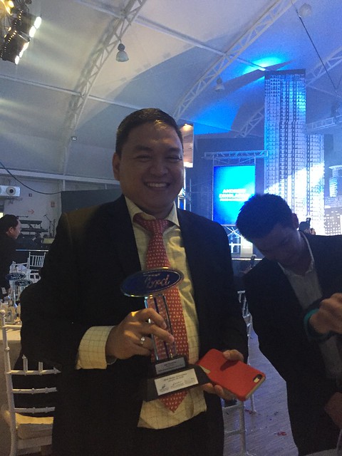 Jay Vicencio,  holding Ford Cainta trophy