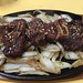Korean BBQ beef served on sizzling onions
