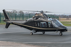 N877SW - 1984 build Agusta A109A II, arriving at City Heliport/Barton just before dusk