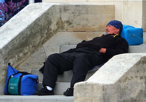 sleeping urban man homeless bags urbanlandscape rogersadler