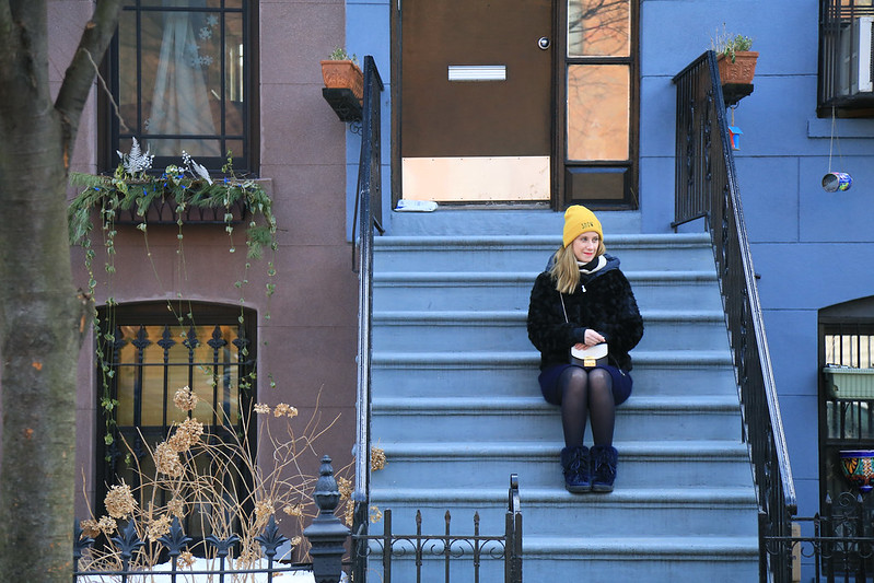 sitting on the front door stairs in brooklyn