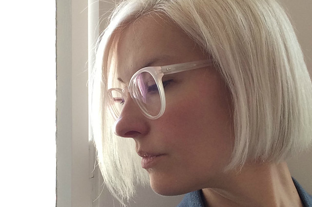 kate wirth platinum hair with ace & tate glasses