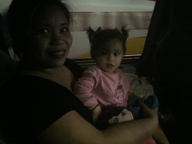 mother and child, waiting for a ride, EDSA