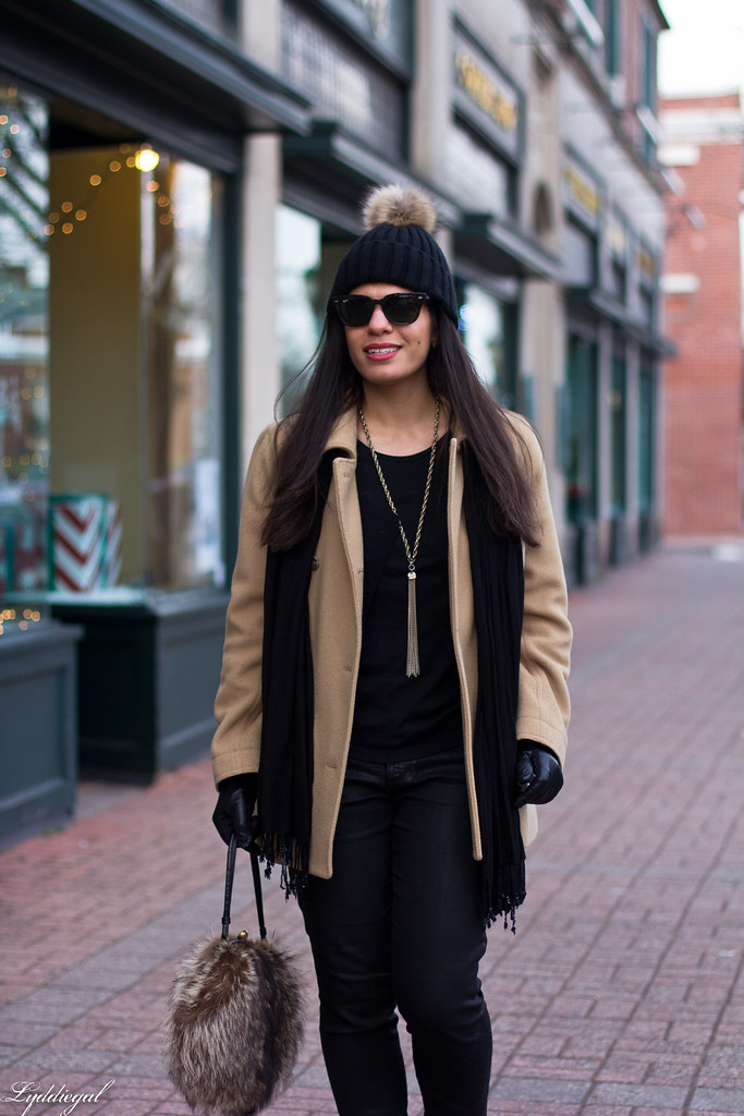 black jeans, black sweater, camel coat, fur pom hat-2.jpg