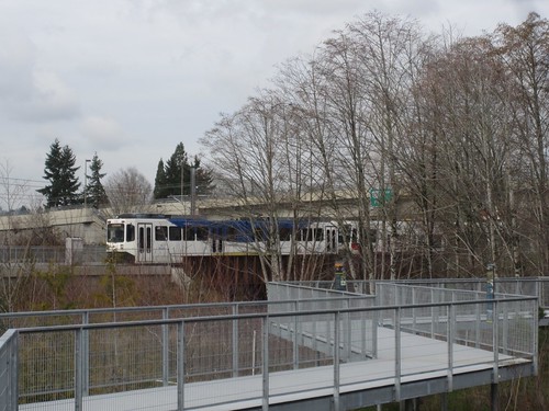 A northbound S/N train leaves Tacoma St station