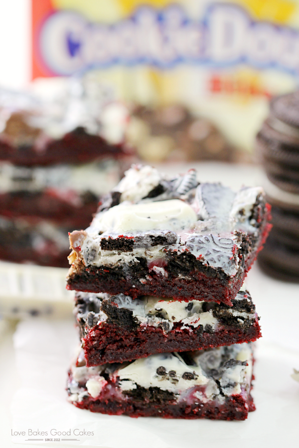 Cookie Lover's Red Velvet Bars stacked on top of each other.