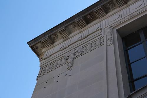 blue sky building window stone first bank frieze structure historic national commercial classical financial carvings doric 1923 cornice architrave revival beauxarts entablature crossettes triglyphs mutules