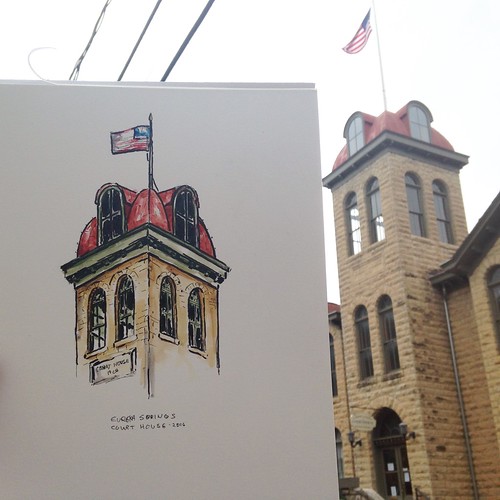 Eureka Springs courthouse in watercolor wash over ink.