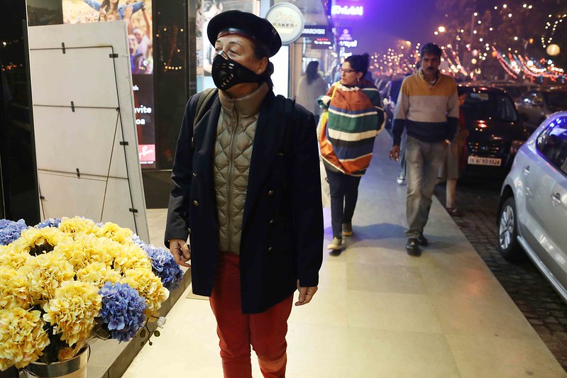 City Moment - The Woman in the Anti-Pollution Mask, Khan Market